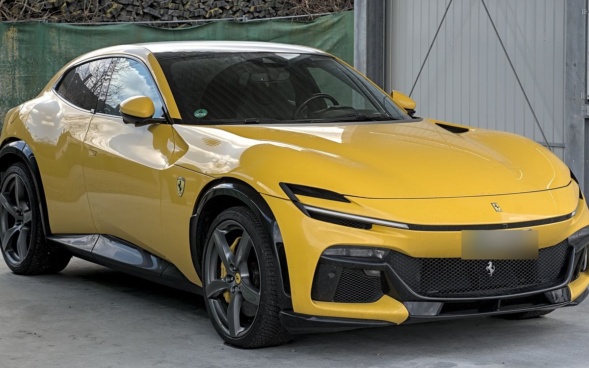 Yellow Ferrari Purosangue, front three-quarter view